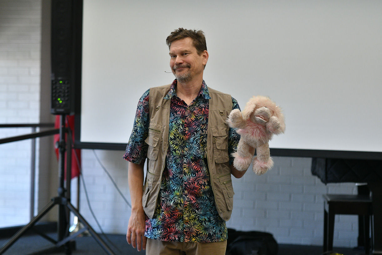 Singing zoologist Lucas Miller visits Bryan library